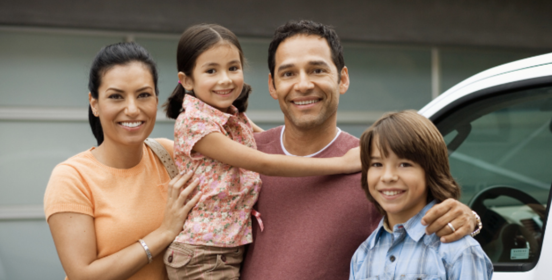 Happy families saving money on auto insurance